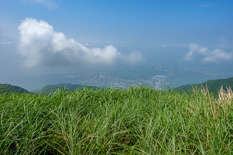 Taiwan-Taipei-Hiking-Datun-Yangmingshan - A view from another peak. Not much of a view due to fog. Dehazed a bit in lightroom to reveal the detail in the city below.