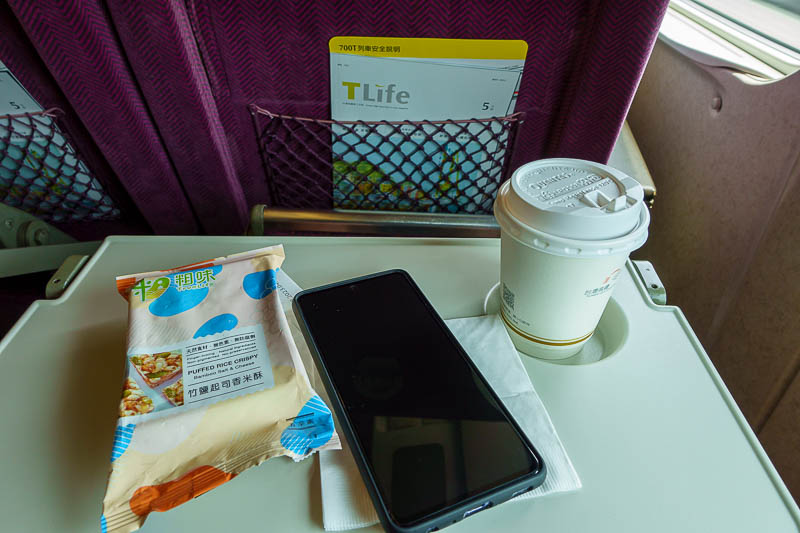 Taiwan for the 5th time - April and May 2023 - Today's train snack was sesame rice crispy things and a cup of tea.